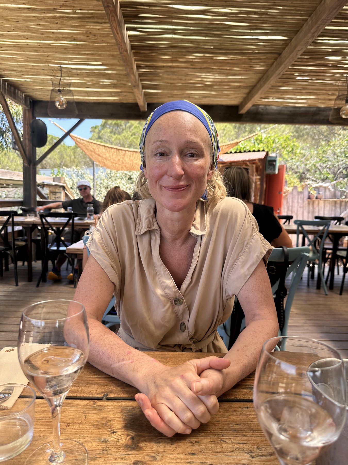 Jo B. smiling outdoors