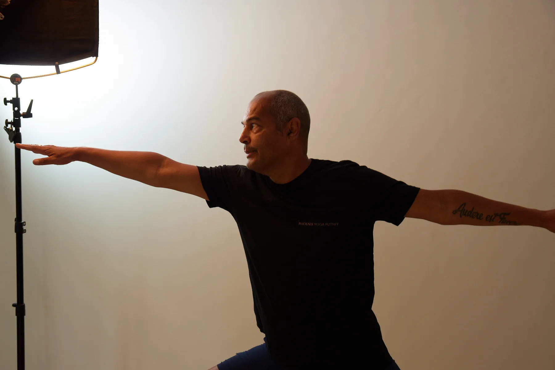 Ray practising yoga at Phoenix Yoga Putney