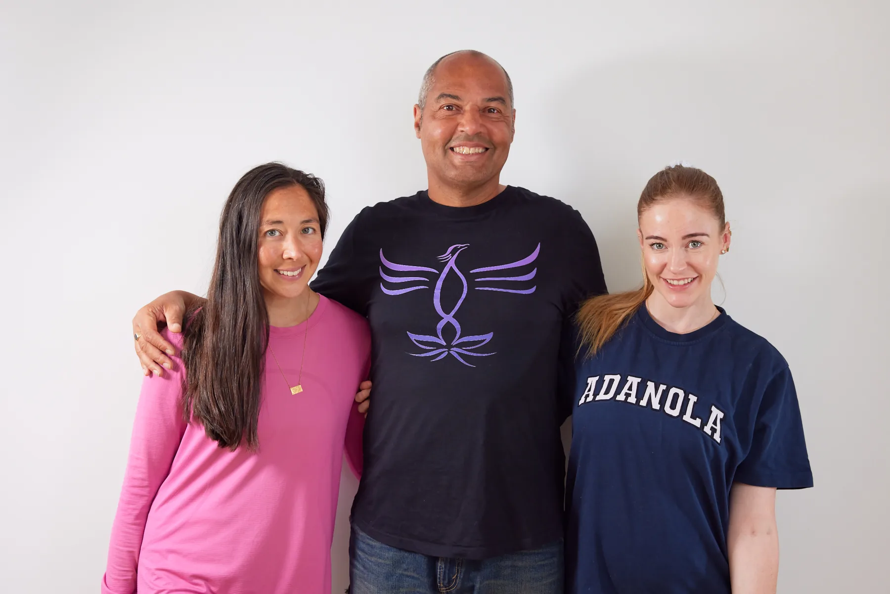 Phoenix Yoga members smiling together in the studio