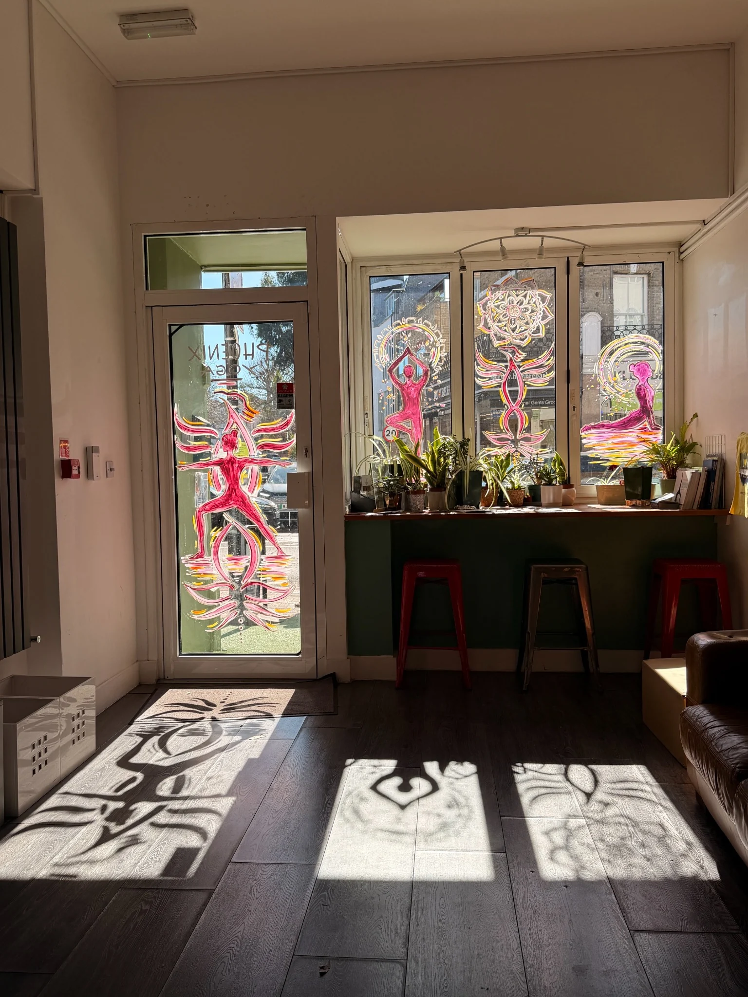The green front door of Phoenix Yoga in Putney