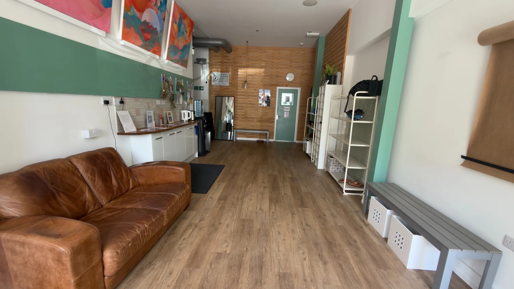 The Phoenix front room with its leather sofa