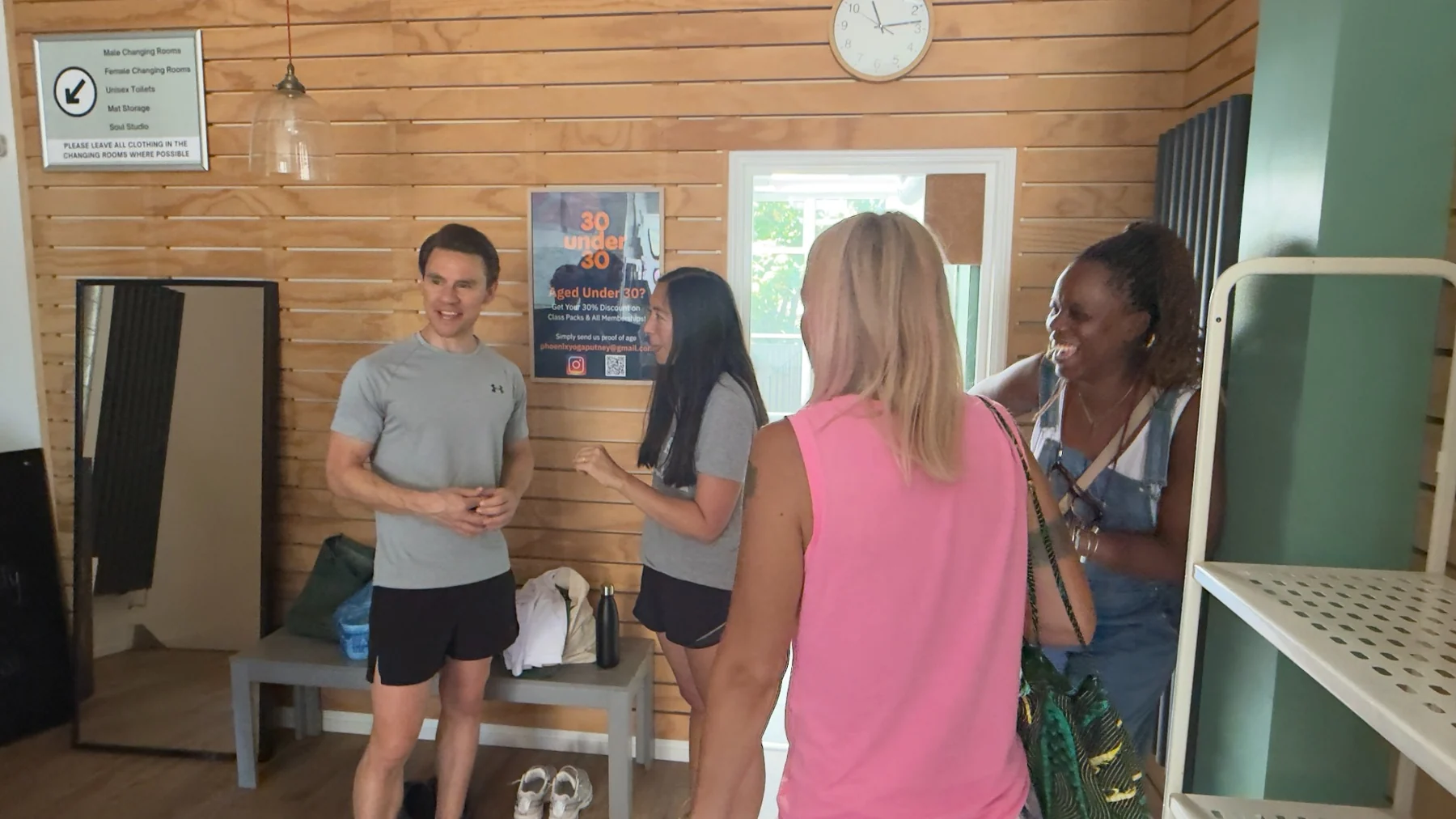 Phoenix customers and teachers talking in the front room
